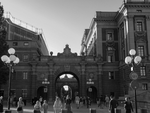 a black and white photo of a grand entryway in Stockholm, Sweden